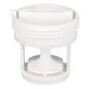 A white plastic washing machine filter part is shown against a white background. Produktbild-Vorschau