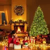 A family celebrating Christmas by a fireplace with a decorated Christmas tree and presents. Podgląd zdjęcia produktu