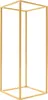 A gold metal geometric stand on a white background. Podgląd zdjęcia produktu