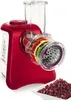 A red and white electric grater with multiple colored attachments is shown on a white background, with a small dish of chopped red vegetables in the foreground. Produktbild-Vorschau