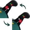 Two close-up views of a green Christmas tree stand's locking mechanism, showing the lever in two different positions indicated by arrows. Náhľad obrázku produktu