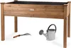 A wooden raised garden bed with gardening tools and a watering can. Produktbild-Vorschau
