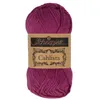 A ball of purple yarn with a label. Produktbild-Vorschau