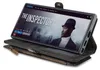 A smartphone in a wallet case is displayed, showing a movie streaming interface on its screen. Produktbild-Vorschau