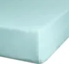 A close-up view of a mint-colored fitted sheet, showing the texture of the fabric and the elasticized edge. Náhľad obrázku produktu