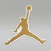 A gold silhouette of a basketball player in mid-air, dunking a ball, against a plain gray background. Produktbild-Vorschau