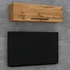 A wooden wall-mounted cabinet above a black television screen, mounted on a gray brick wall. Voir les images du produit