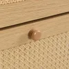 Close-up of a wooden drawer with a rattan weave pattern and a wooden knob. Podgląd zdjęcia produktu