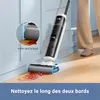 A person is using a wet/dry vacuum cleaner to clean up a spill on a wooden floor, with a close-up inset showing the vacuum cleaning close to an edge. Produktbild-Vorschau