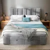 A bed with a headboard, pillows, and blankets is shown in a bedroom setting. Produktbild-Vorschau