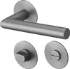 A set of door hardware, including a lever handle and two rosettes, is displayed against a white background. Produktbild-Vorschau