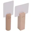 Two wooden figures with white cards attached, presented against a white background. Voir les images du produit