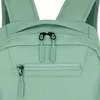 A close-up view of the zippers and straps of a green backpack. Podgląd zdjęcia produktu