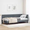 A dark gray corner daybed with a headboard is shown in a room with two framed pictures on the wall and sheer curtains in the background. Produktbild-Vorschau