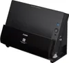 A black Canon imageFORMULA DR-C225II scanner is shown from a slightly elevated front-left angle. Voir les images du produit