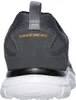 The back view of a charcoal and black Skechers shoe with a white sole. Produktbild-Vorschau
