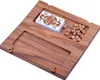 A wooden board game with a deck of cards and game pieces. Produktbild-Vorschau