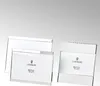 Two silver-plated photo frames are displayed against a light gray background. Produktbild-Vorschau