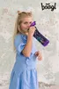 A young girl is drinking from a water bottle. Voir les images du produit