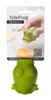 A hand is shown using a green frog-shaped egg separator to extract an egg yolk from a cracked egg into a glass bowl. Produktbild-Vorschau