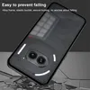 A phone case is shown at an angle, appearing to be falling onto a surface that is breaking apart into shards. Náhled obrázku produktu