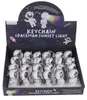 Astronautský přívěšek na klíče s efektem západu slunce - Náhled obrázku produktu 6
