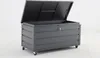 A dark gray storage box with its lid open, shown on a white background. Produktbild-Vorschau