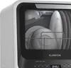 Close-up view of the interior of a compact dishwasher filled with dishes, showing the racks and some of the controls on the front panel. Náhľad obrázku produktu
