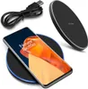A smartphone is placed on a wireless charging pad, with a USB cable in the background. Produktbild-Vorschau