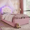 A child's bedroom with a pink bed, decorated in a princess theme. Produktbild-Vorschau
