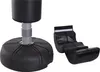 A black punching bag with a weighted base and a separate black training pad are shown against a white background. Produktbild-Vorschau