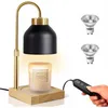 A candle warmer lamp with a candle and a remote control, along with spare bulbs. Náhled obrázku produktu
