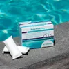 Product packaging and two individual units of pool clarifier placed on a stone surface next to a swimming pool. Anteprima dell’immagine prodotto