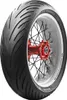 A close-up shot of a motorcycle tire mounted on a spoked wheel with a red hub. Anteprima dell’immagine prodotto