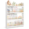 A white four-tier bookshelf filled with children's books and small toys. Produktbild-Vorschau