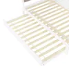 A close-up view of a white bed frame with wooden slats, showing a pull-out trundle bed. Náhled obrázku produktu