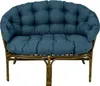 A blue cushioned rattan sofa. Produktbild-Vorschau