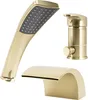 A set of gold-colored bathroom fixtures, including a handheld showerhead, a faucet, and a waterfall spout, arranged against a white background. Produktbild-Vorschau
