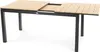 A table with a wooden top and black legs, shown from a slightly elevated angle. Produktbild-Vorschau