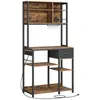 A freestanding kitchen shelf unit with multiple shelves, a drawer, and hooks. Produktbild-Vorschau