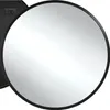A round mirror with a black frame against a white background. Produktbild-Vorschau