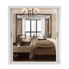 A reflection of a bedroom interior is shown in a wardrobe with mirrored doors. Náhľad obrázku produktu