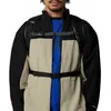 A person wearing a jacket with straps. Produktbild-Vorschau