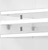 Close-up view of two white shelves with metal brackets, illustrating installation or support. Produktbild-Vorschau