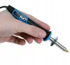 A hand holding a brand burning pen. Podgląd zdjęcia produktu
