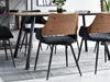 A dining room setting with a wooden table and chairs. Náhled obrázku produktu