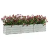 A long, rectangular planter box filled with pink and red flowers, set against a white background. Náhled obrázku produktu