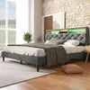 A bedroom scene with a bed as the main focus.