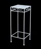 A white metal plant stand on a black background. Anteprima dell’immagine prodotto