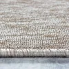 A close-up view of the edge and texture of a carpet. Produktbild-Vorschau